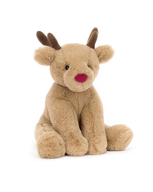 Plush toy resembling a reindeer with light brown fur, darker brown antlers, a red nose, black eyes, and front legs extended forward in a seated position.