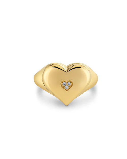 Gold heart-shaped ring featuring a smaller central heart adorned with four small diamonds, creating an elegant and sparkling design.