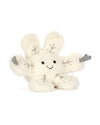 White plush toy shaped like a snowflake with six fluffy arms ending in gray tips, embroidered branch-like details, and a smiling face with black eyes and a curved mouth.