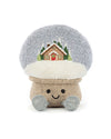 Plush toy shaped like a mushroom with a fluffy light gray cap featuring an embroidered snowy cabin scene, a burlap-textured stem, two light blue feet, and a smiling face with black eyes.