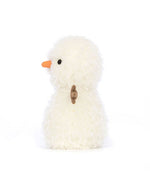 Plush toy resembling a snowman with white fluffy material, black eyes, an orange carrot-shaped nose, and a small brown fabric accessory on its side.