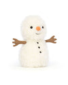 Plush toy resembling a snowman with a fluffy white body, black button eyes, an orange carrot-shaped nose, a small smile, brown stick-like fabric arms, and three black buttons down the front.