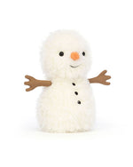 Plush toy resembling a snowman with a fluffy white body, black button eyes, an orange carrot-shaped nose, a small smile, brown stick-like fabric arms, and three black buttons down the front.