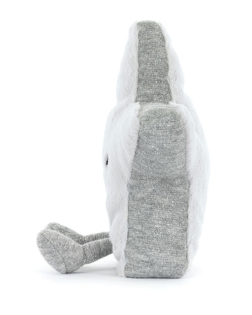 Side view of a plush star-shaped toy in light gray with shimmery silver edges and two small gray legs. The star’s profile shows its thickness and soft texture.