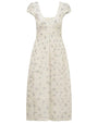 Front view of a white ankle-length dress with short flutter sleeves, a deep V-neckline, and a subtle blue floral pattern. The dress features lace detailing and a fitted waist with a flowing skirt.