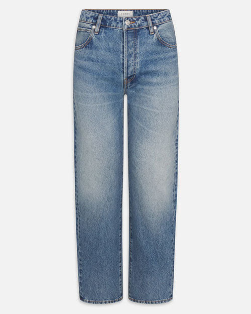 Product image of medium-wash blue denim jeans displayed flat against a light background, featuring a mid-rise waist with belt loops, a button and zip fly closure, and classic five-pocket styling. The jeans have a straight-leg silhouette with subtle fading and whiskering across the front for a worn-in look.