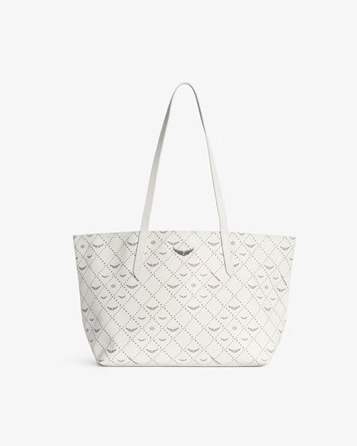 White leather tote bag with an open-top design, featuring a diamond-patterned perforated detail and two long shoulder straps, displayed against a plain white background.