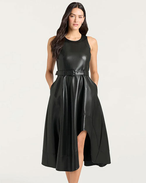  A sleeveless black faux leather midi dress with a fitted bodice and a flared skirt. The dress features a round neckline, a belted waist with a matching black belt, and a front slit that reveals part of the leg. The material has a smooth, glossy finish, and the dress includes side pockets for added detail.