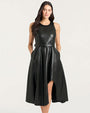  A sleeveless black faux leather midi dress with a fitted bodice and a flared skirt. The dress features a round neckline, a belted waist with a matching black belt, and a front slit that reveals part of the leg. The material has a smooth, glossy finish, and the dress includes side pockets for added detail.
