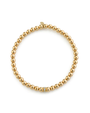 Gold beaded bracelet on a white background