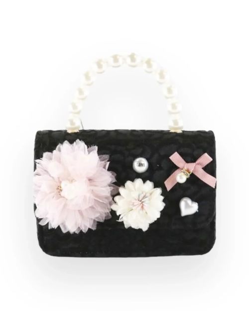 A stylish black purse featuring floral embellishments and pearl accents, combining elegance with a modern touch.