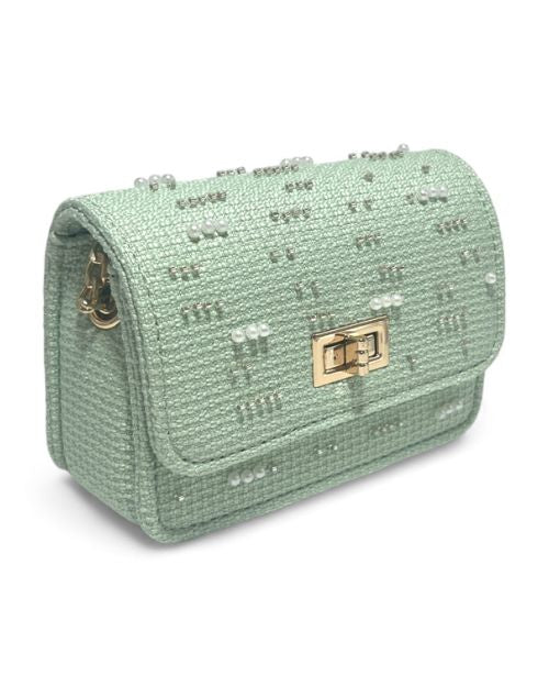 A green woven bag for kids, featuring decorative pearls and metal hardware, ideal for playful fashion.