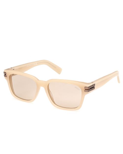 Stylish sunglasses with a beige frame and brown lenses