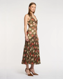 Woman wearing a floral dress on a white background