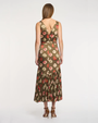 Woman wearing a floral dress on a white background