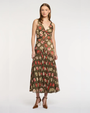 Woman wearing a floral dress on a white background