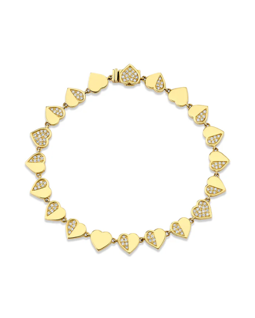 Gold bracelet with heart-shaped links on a white background