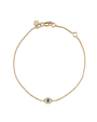 Gold bracelet with a blue gemstone and clear stones on a white background