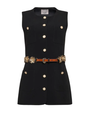 Black sleeveless jacket with gold buttons and a belt on a white background
