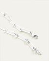 Close-up of silver chain necklace, showcasing adjustable clasp closure.