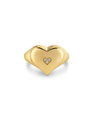 Gold heart-shaped ring with a smaller heart inset on a white background