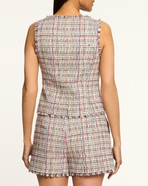 Multicolored tweed vest and shorts worn by a person on a white background