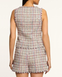 Multicolored tweed vest and shorts worn by a person on a white background