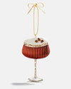  A glass ornament shaped like a coffee cup, showcasing intricate details and a warm, inviting design.
