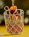  A festive Christmas ornament featuring a cocktail served in a glass, adding a playful touch to holiday decorations.