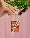 A holiday ornament showcasing a playful sushi illustration, merging the spirit of Christmas with a love for sushi.