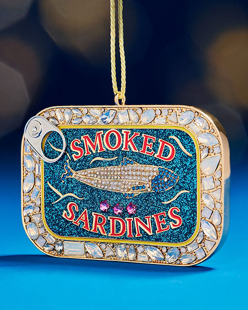 A Christmas tree ornament shaped like smoked sardines, adding a unique touch to holiday decorations.