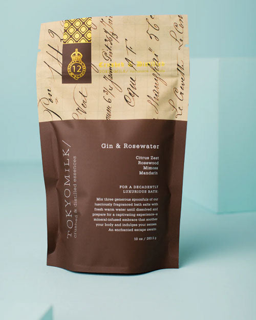 A bag of fragrant rose petal bath salts, creating a calming and luxurious bathing experience.