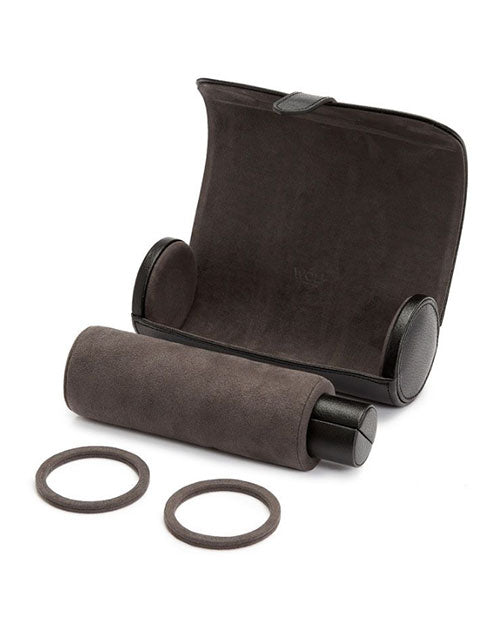 A sleek black leather watch case opened showcasing the Ultrasuede lining and patented watch guards.
