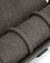 Up-close image of the watch roll and watch guards showing the leather and Ultrasuede 