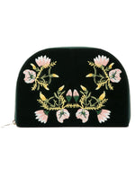 Elegant forest green velvet jewelry case adorned with colorful floral embroidery.