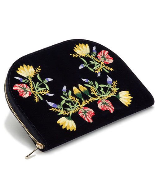 Elegant indigo velvet jewelry case adorned with colorful floral embroidery.
