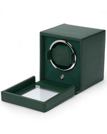  Elegant green watch winder featuring a glass cover, ensuring easy maintenance for your timepiece.