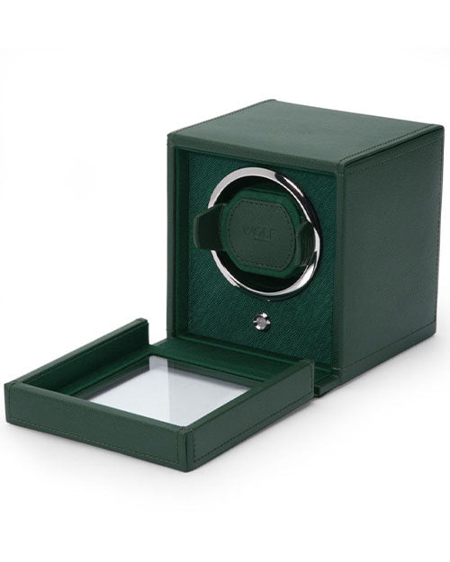  Elegant green watch winder featuring a glass cover, ensuring easy maintenance for your timepiece.