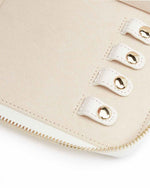 Up-close image of 4 snap-on necklace hooks with pocket. 