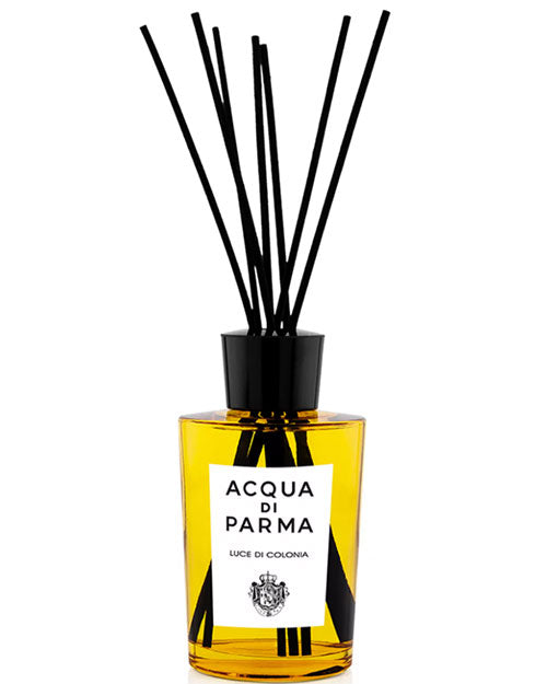 Acqua Parma reed diffuser presented in a chic glass bottle, exuding elegance and enhancing home ambiance.