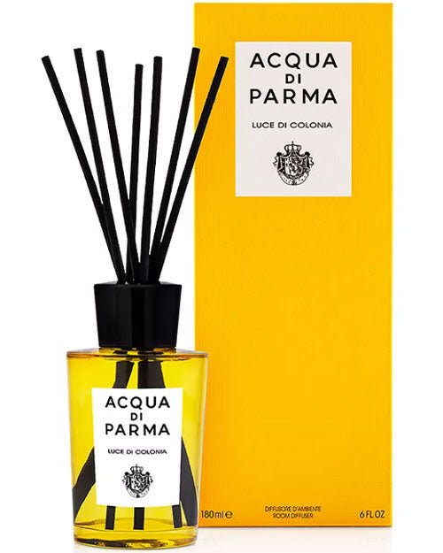 Elegant Acqua Parma reed diffuser in a stylish glass bottle, showcasing a sophisticated home fragrance design.