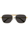 A pair of sunglasses with dark lenses and a gold and silver frame. The brand name 'Cartier' is visible on the top left lens.