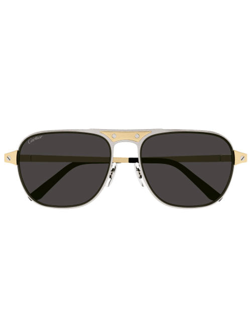 A pair of sunglasses with dark lenses and a gold and silver frame. The brand name 'Cartier' is visible on the top left lens.
