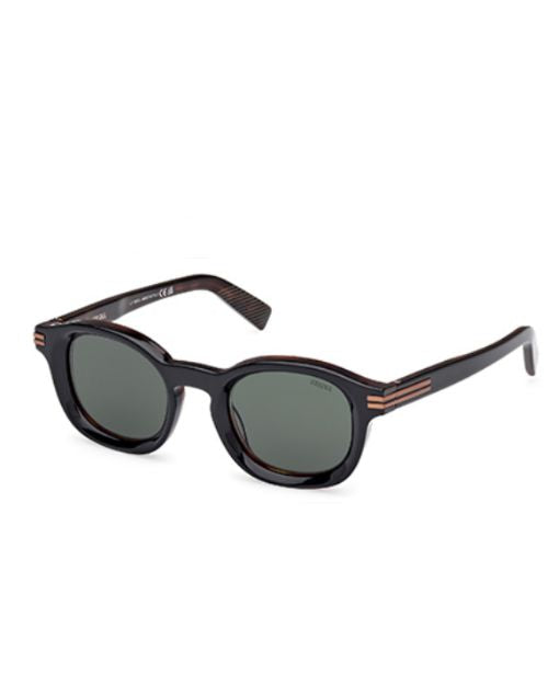 Black sunglasses with a stylish brown frame, showcasing a modern design suitable for various occasions.