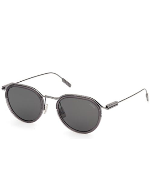 Black sunglasses featuring shiny grey metal frames and smoke lenses