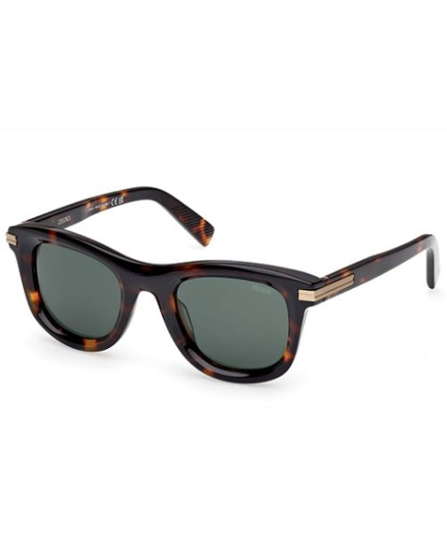 Stylish tortoise shell sunglasses accented with a gold frame, combining classic and modern aesthetics.