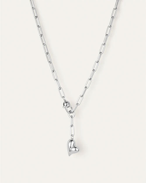 A silver necklace featuring a heart charm, elegantly designed and suitable for various occasions.