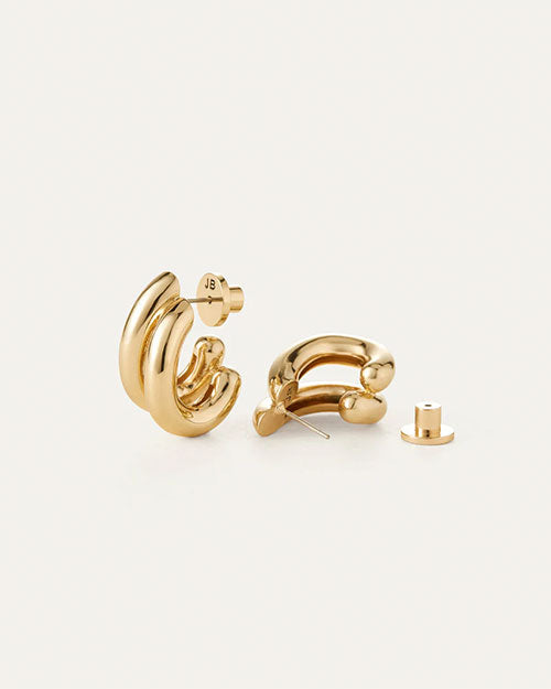 Stylish gold hoop earrings, featuring a smooth, shiny finish for a sophisticated look.