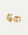 Stylish gold hoop earrings, featuring a smooth, shiny finish for a sophisticated look.