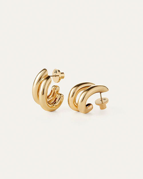 Stylish gold hoop earrings, featuring a smooth, shiny finish for a sophisticated look.